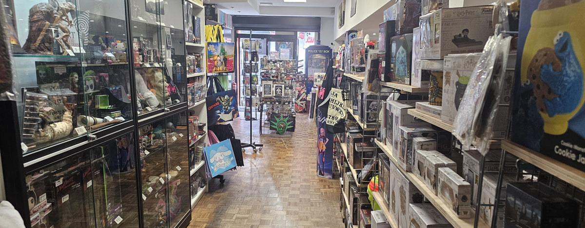 Shelves of comics and collectibles inside Geek Out Lincoln