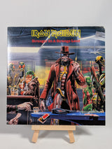 Iron Maiden Stranger in a Strange Land 7" Vinyl Record (2014 Parlophone Reissue)